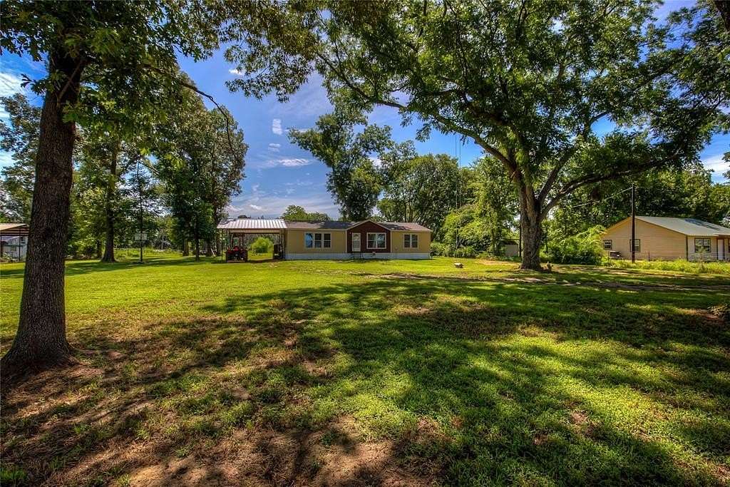 14.7 Acres of Recreational Land with Home for Sale in Como, Texas