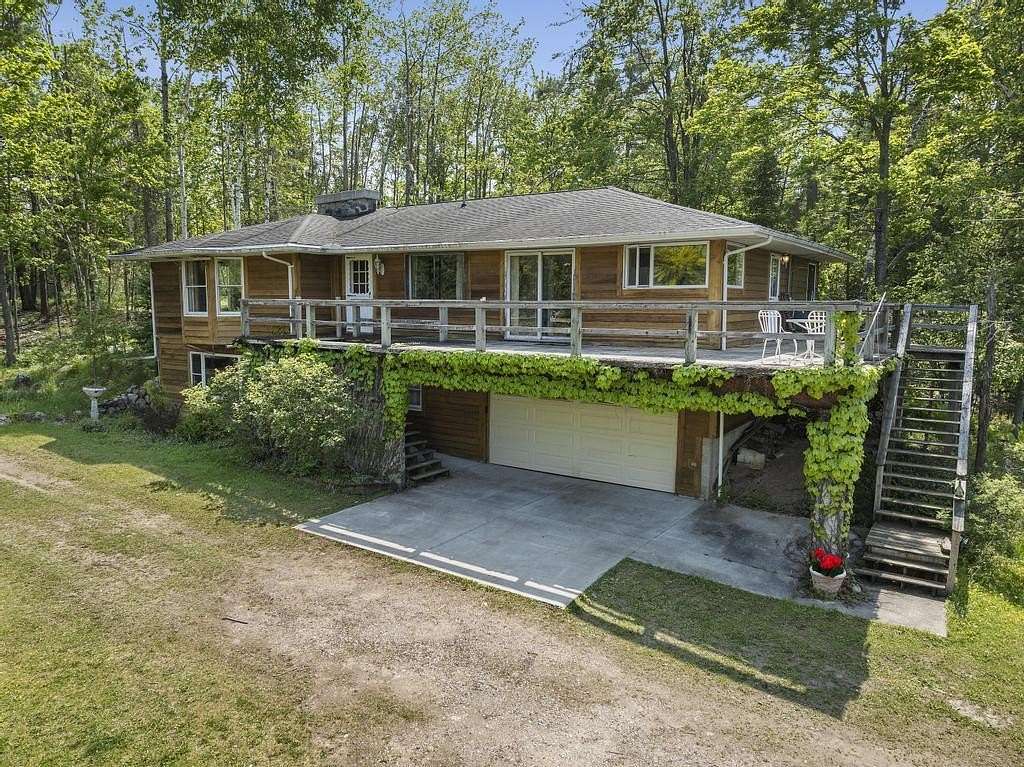 235 Acres of Land with Home for Sale in Millersburg, Michigan