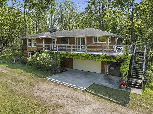 235 Acres of Land with Home for Sale in Millersburg, Michigan