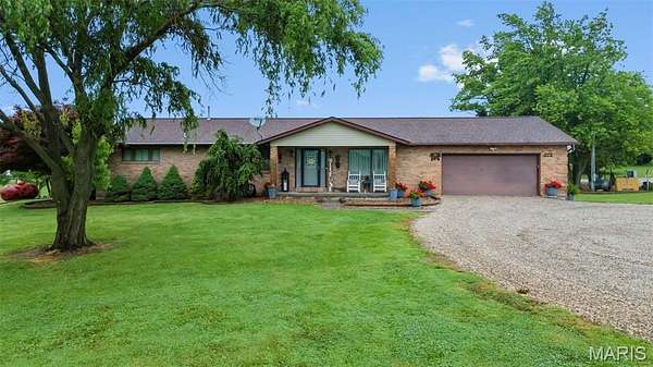 9.34 Acres of Residential Land with Home for Sale in Jackson, Missouri