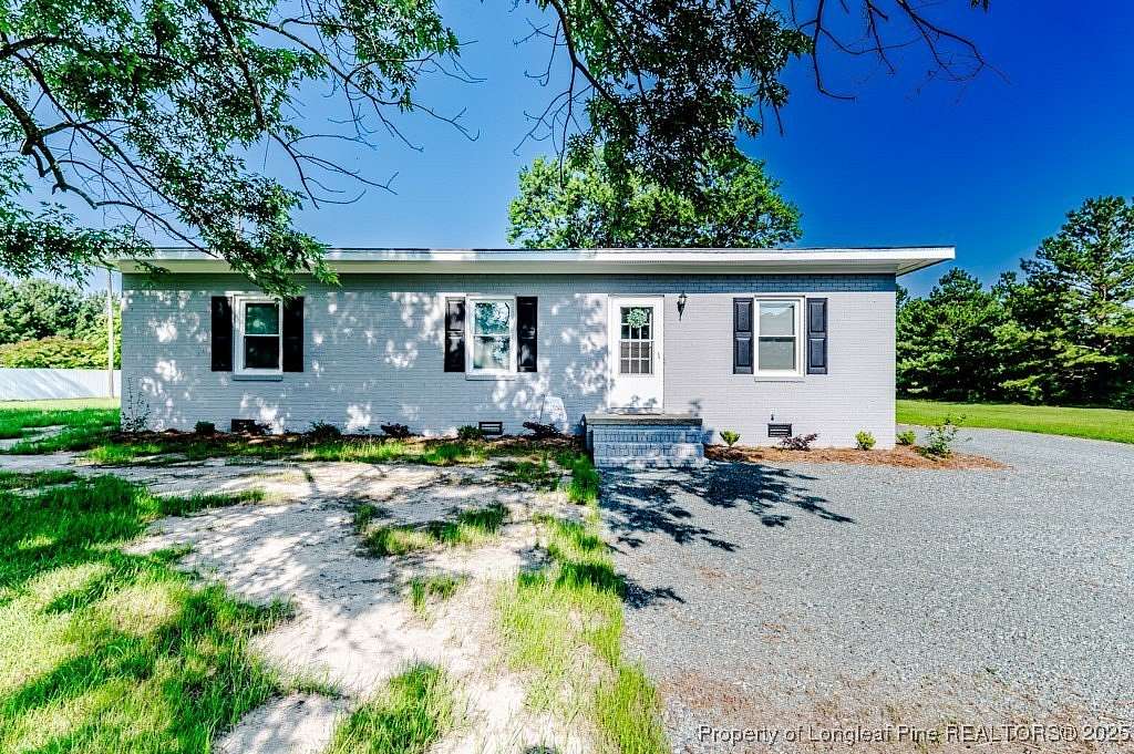 0.54 Acres of Land with Home for Sale in Sanford, North Carolina