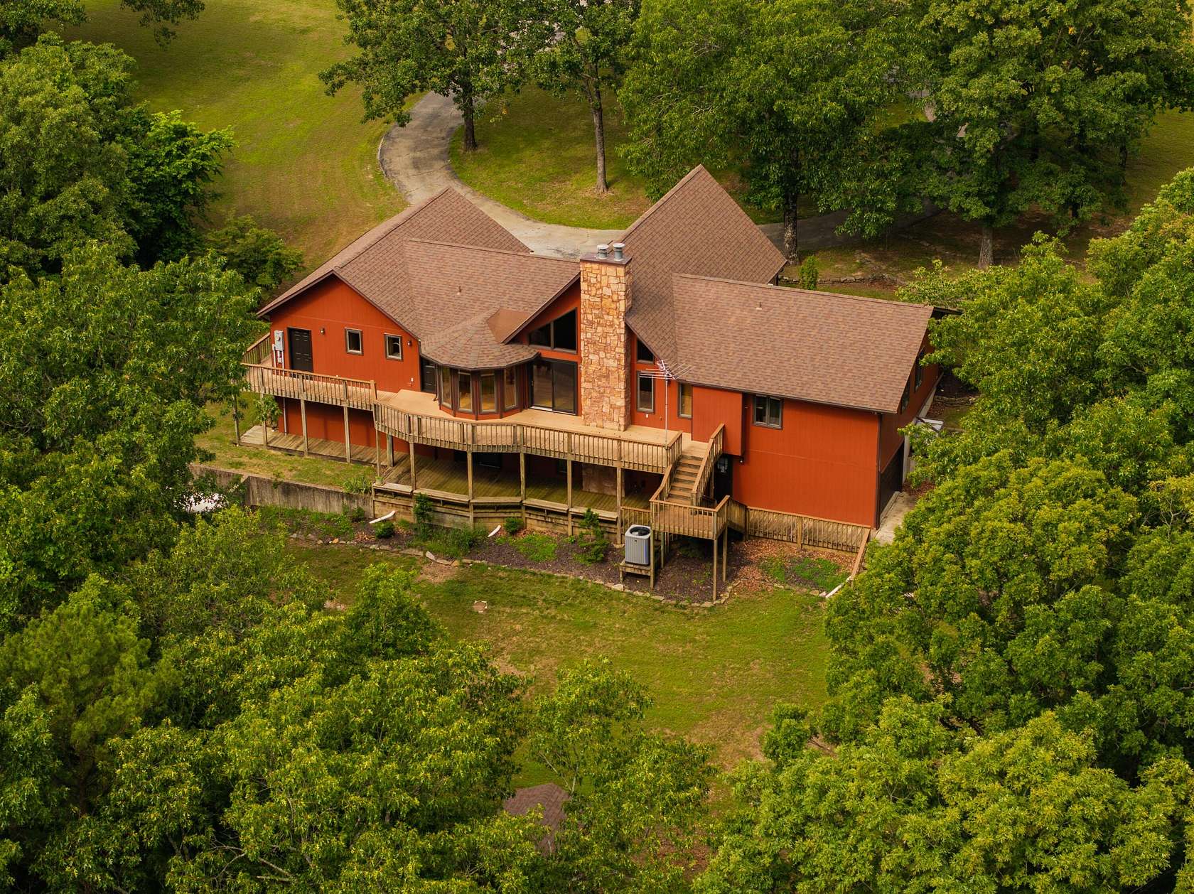 7.6 Acres of Residential Land with Home for Sale in Lampe, Missouri