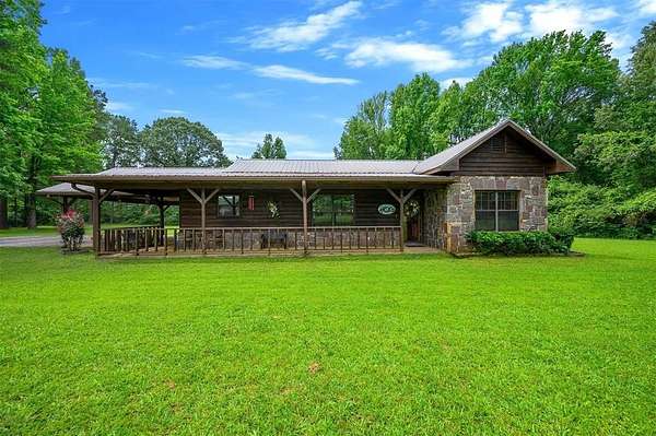 4.69 Acres of Residential Land with Home for Sale in Broken Bow, Oklahoma