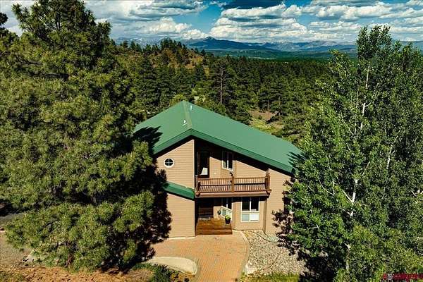 5.35 Acres of Residential Land with Home for Sale in Pagosa Springs, Colorado