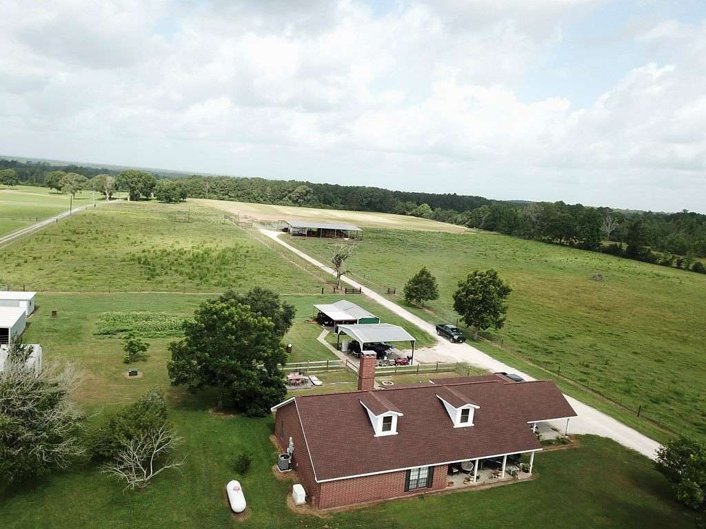 38 Acres of Agricultural Land with Home for Sale in Kirbyville, Texas