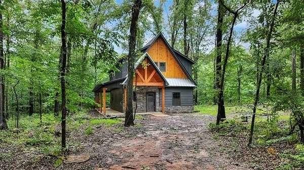 2.5 Acres of Land with Home for Sale in Milburn, Oklahoma