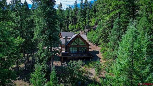 5 Acres of Residential Land with Home for Sale in Pagosa Springs, Colorado