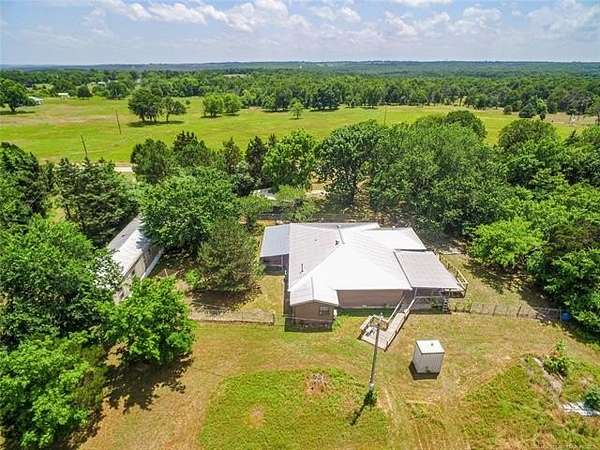 10 Acres of Land with Home for Sale in Cleveland, Oklahoma