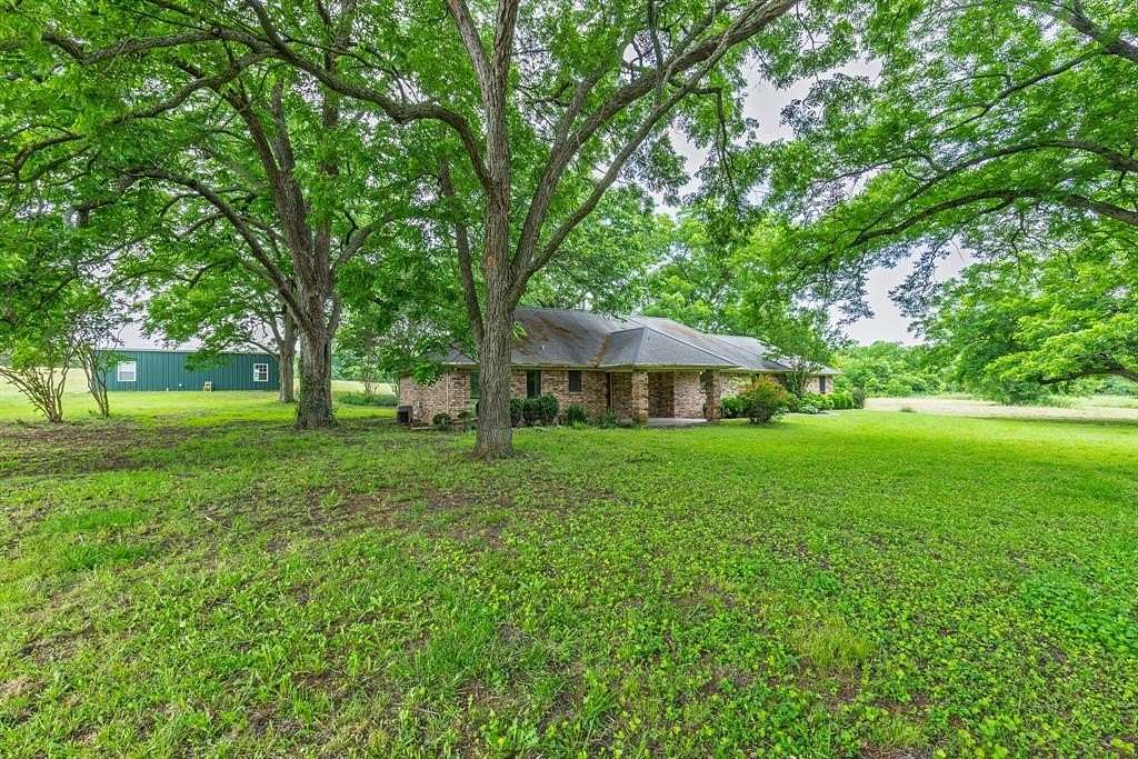 5 Acres of Residential Land with Home for Sale in Leonard, Texas