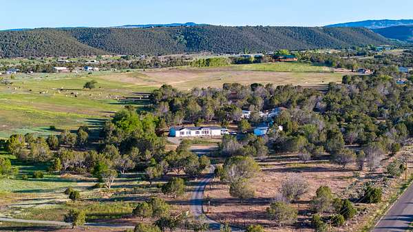 5.3 Acres of Land with Home for Sale in Hotchkiss, Colorado