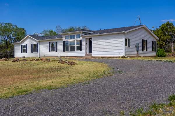 5.3 Acres of Land with Home for Sale in Hotchkiss, Colorado