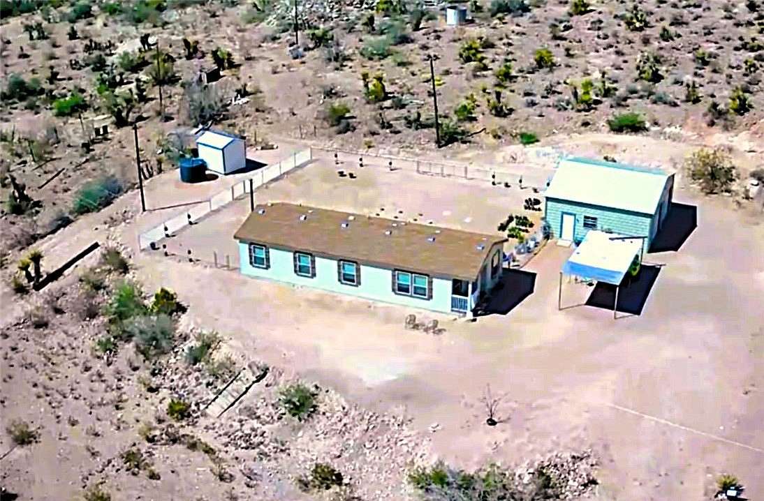121 Acres of Land with Home for Sale in Golden Valley, Arizona