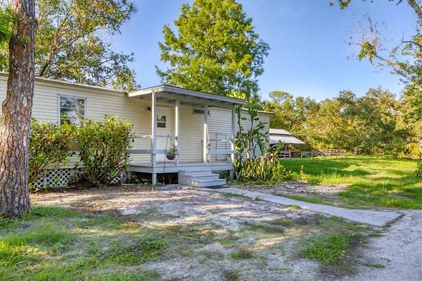 8.38 Acres of Land with Home for Sale in Myakka City, Florida