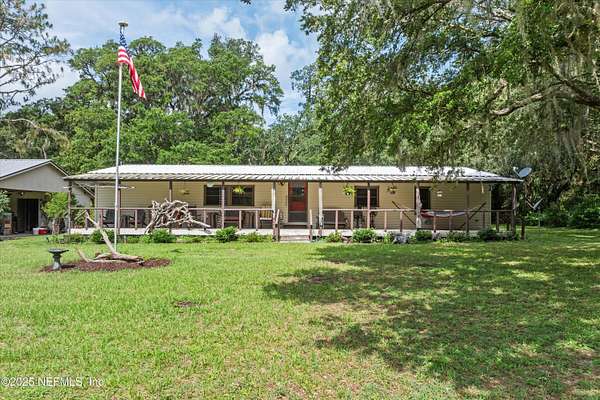 5 Acres of Residential Land with Home for Sale in Satsuma, Florida