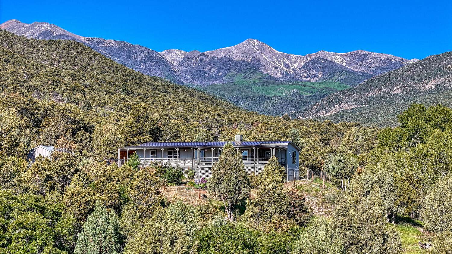 2.4 Acres of Residential Land with Home for Sale in Howard, Colorado