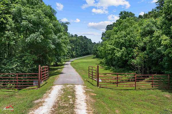 41.7 Acres of Recreational Land with Home for Sale in Shelbyville, Texas