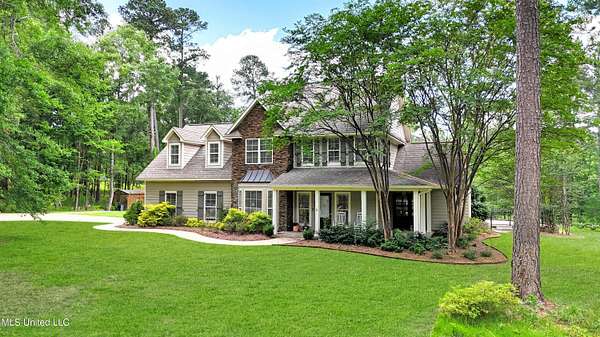 2.1 Acres of Residential Land with Home for Sale in Madison, Mississippi