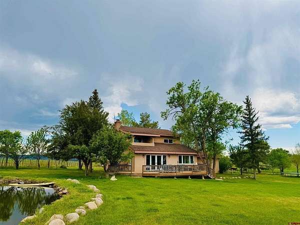 4.7 Acres of Residential Land with Home for Sale in Durango, Colorado