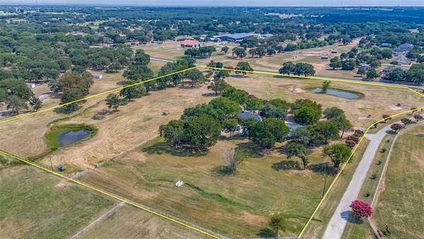 11.2 Acres of Land with Home for Sale in Pilot Point, Texas