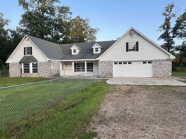 7 Acres of Residential Land with Home for Sale in Dierks, Arkansas