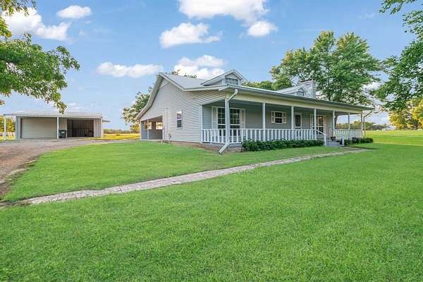 12.1 Acres of Land with Home for Sale in Paris, Texas