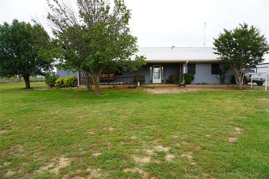 10 Acres of Land with Home for Sale in Poolville, Texas