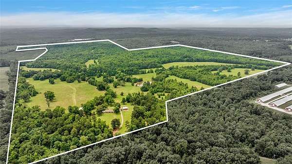 322 Acres of Land with Home for Sale in Ore City, Texas