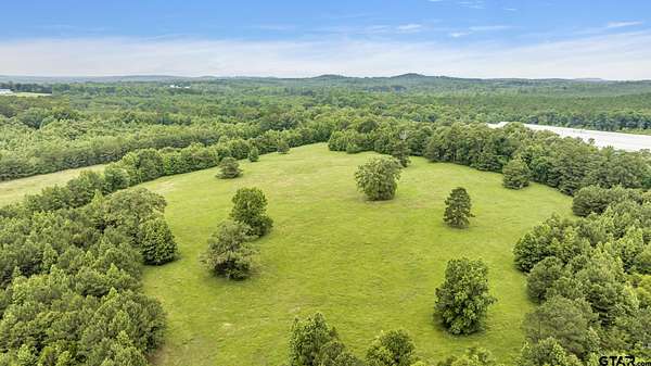 322 Acres of Land with Home for Sale in Ore City, Texas