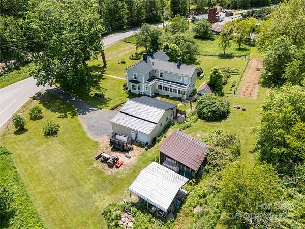 3.79 Acres of Residential Land with Home for Sale in Lansing, North Carolina