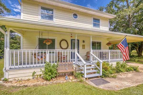 2.43 Acres of Residential Land with Home for Sale in Baker, Florida