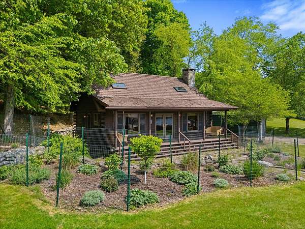 7.56 Acres of Residential Land with Home for Sale in Grand Lake Stream, Maine