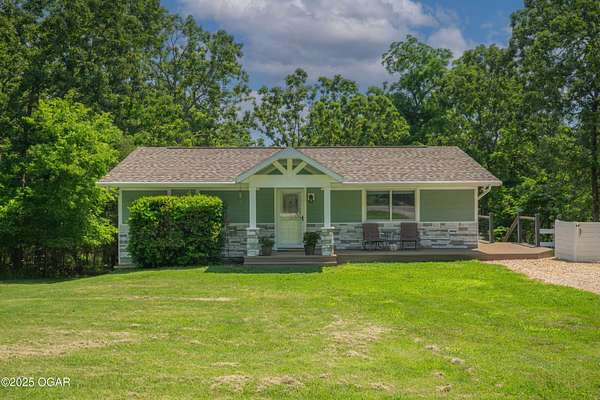 5 Acres of Residential Land with Home for Sale in Golden, Missouri