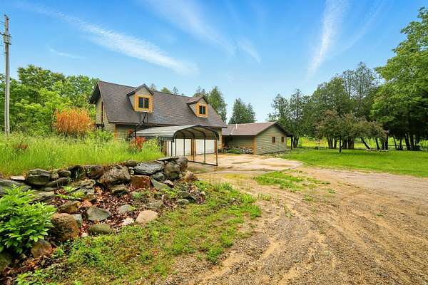 2.5 Acres of Residential Land with Home for Sale in Paris, Michigan