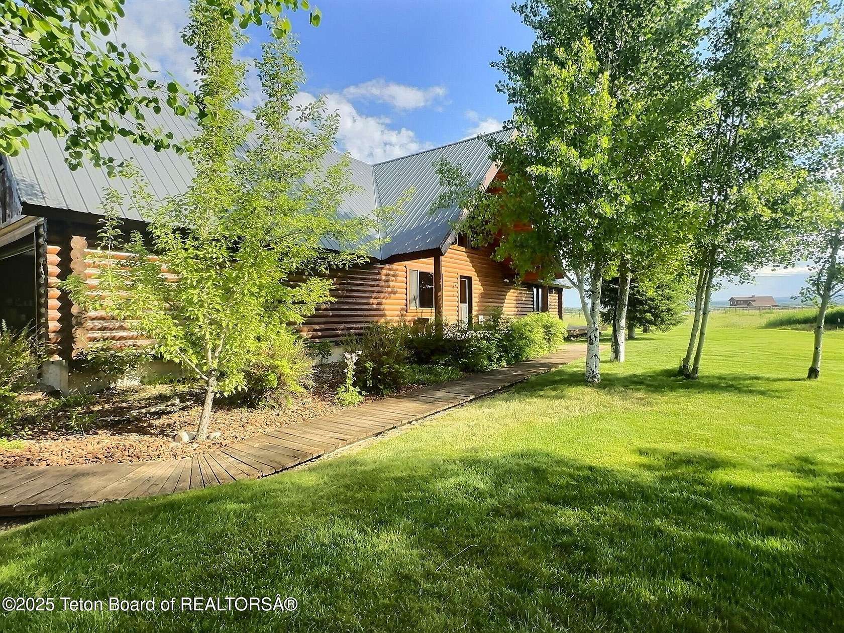 2.1 Acres of Residential Land with Home for Sale in Driggs, Idaho