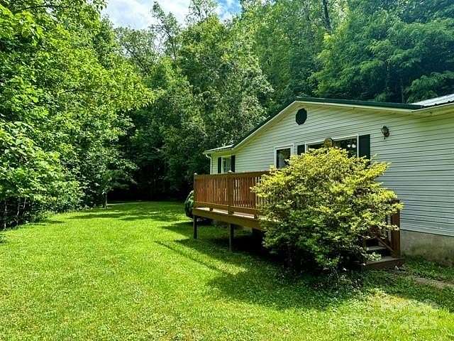 2 Acres of Residential Land with Home for Sale in Balsam Grove, North Carolina