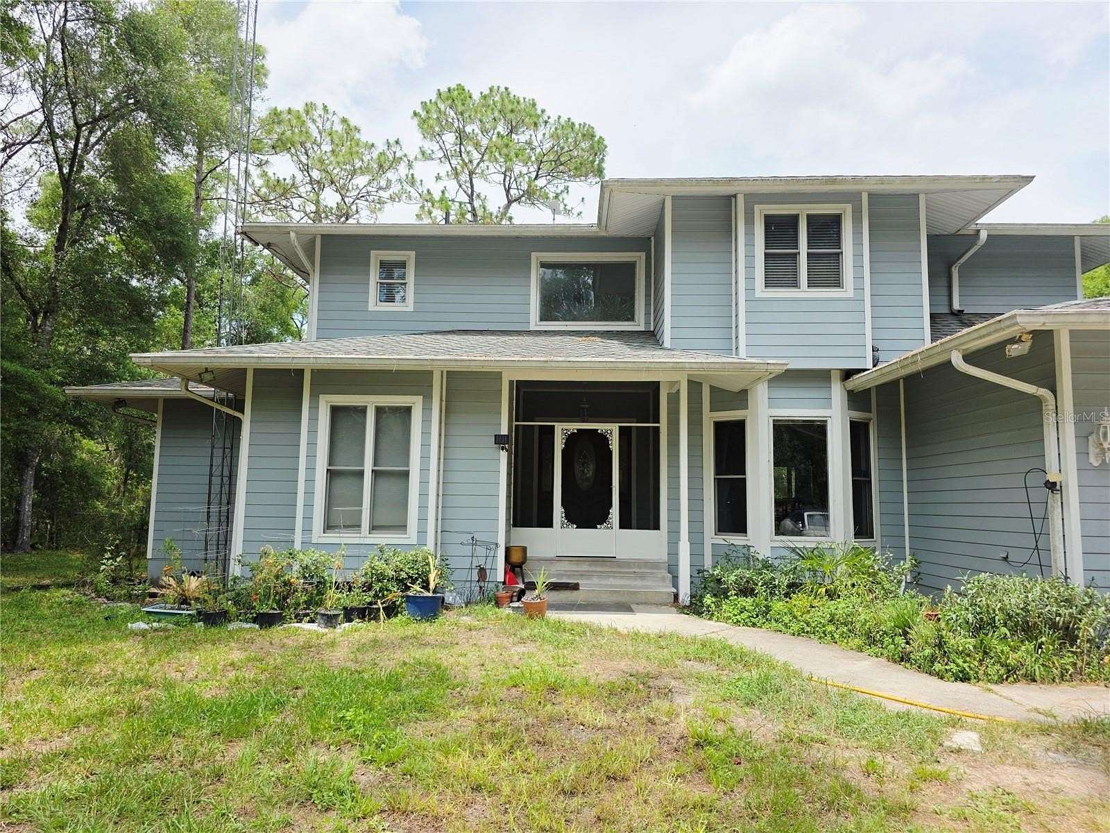 1.73 Acres of Residential Land with Home for Sale in Dunnellon, Florida