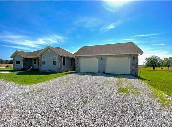 37.8 Acres of Agricultural Land with Home for Sale in Stark City, Missouri