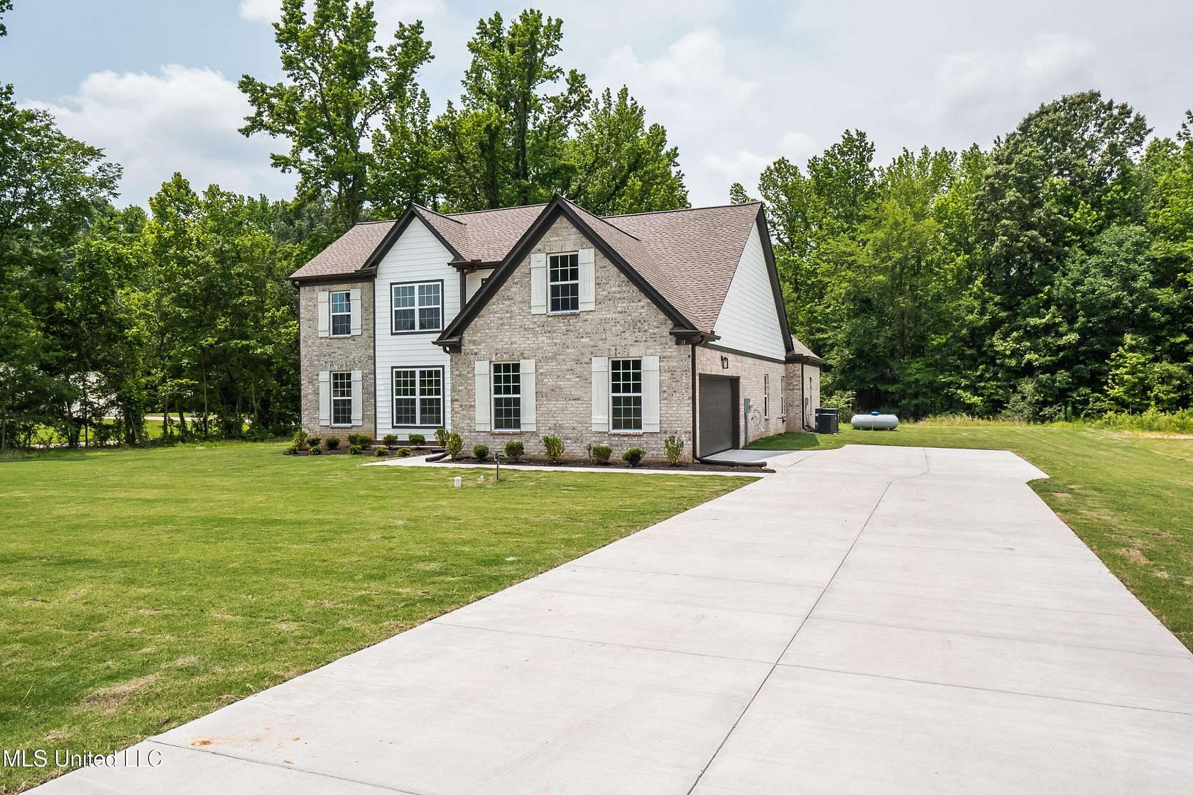 1.5 Acres of Residential Land with Home for Sale in Byhalia, Mississippi