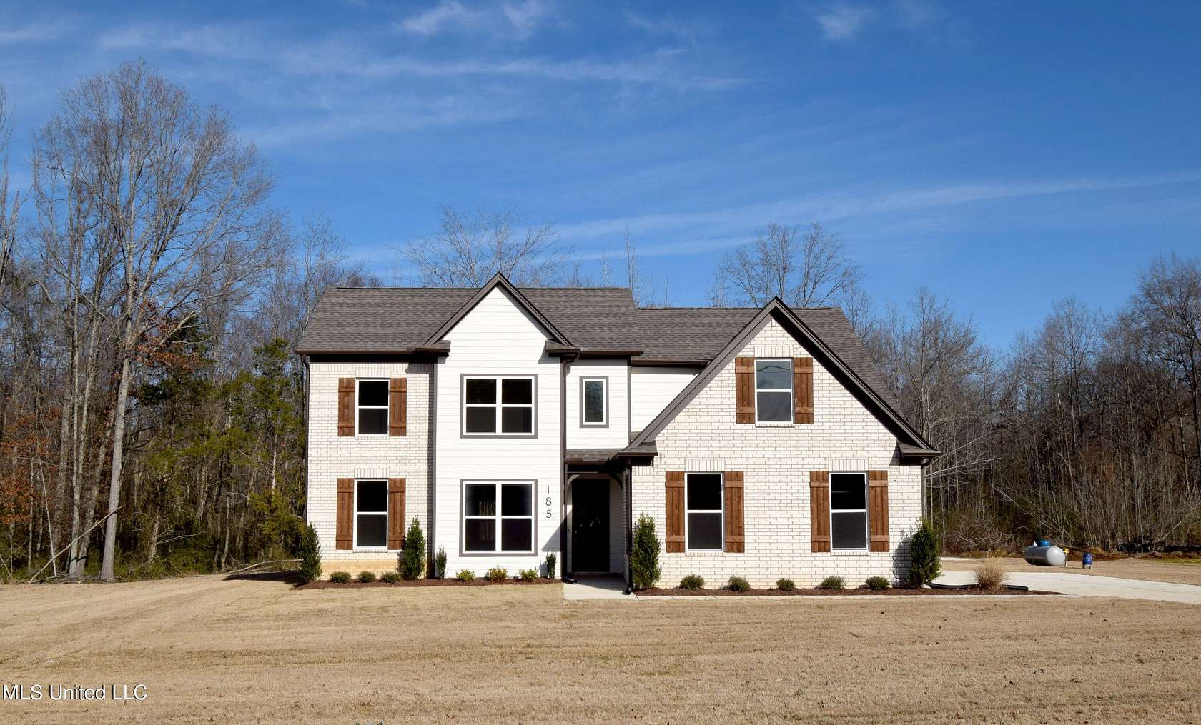 1.5 Acres of Residential Land with Home for Sale in Byhalia, Mississippi