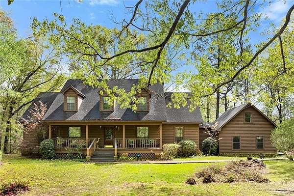 8.68 Acres of Residential Land with Home for Sale in Chunchula, Alabama