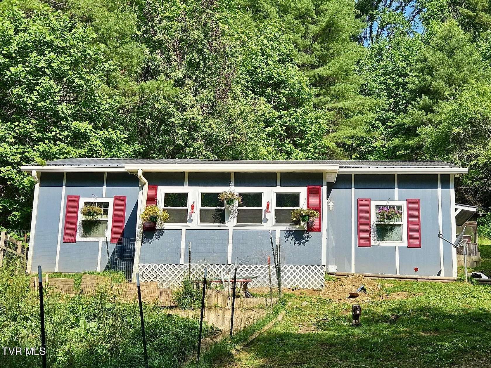 9.47 Acres of Residential Land with Home for Sale in Mountain City, Tennessee