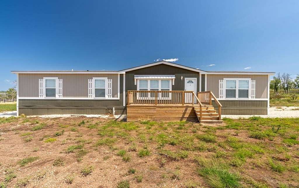 5.13 Acres of Residential Land with Home for Sale in Mountain Home, Texas