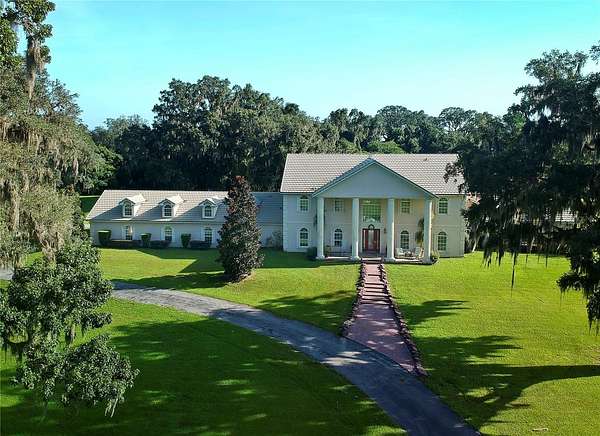 90 Acres of Agricultural Land with Home for Sale in Ocala, Florida