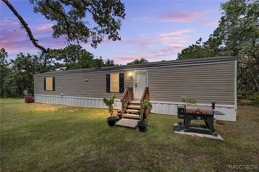 5 Acres of Residential Land with Home for Sale in Inverness, Florida