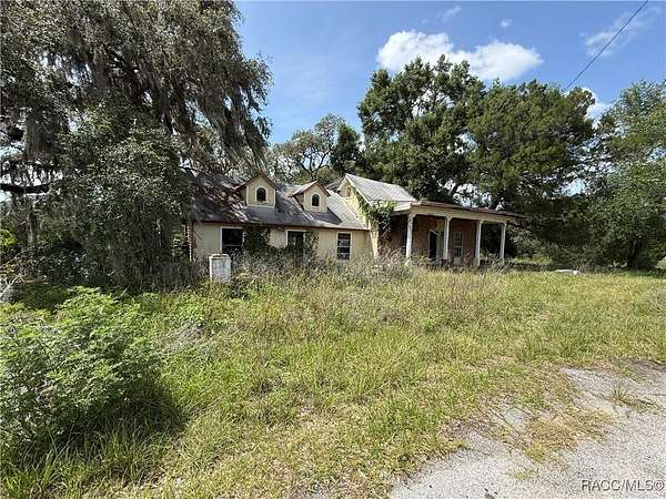 2.44 Acres of Land with Home for Sale in Floral City, Florida