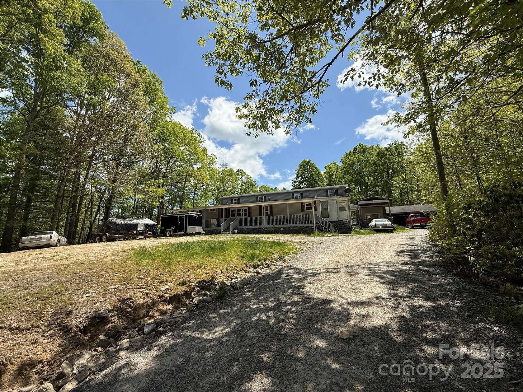 5 Acres of Residential Land with Home for Sale in Cedar Mountain, North Carolina