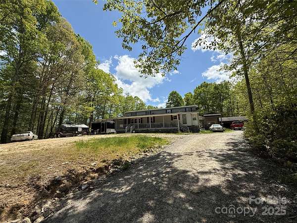 5 Acres of Residential Land with Home for Sale in Cedar Mountain, North Carolina