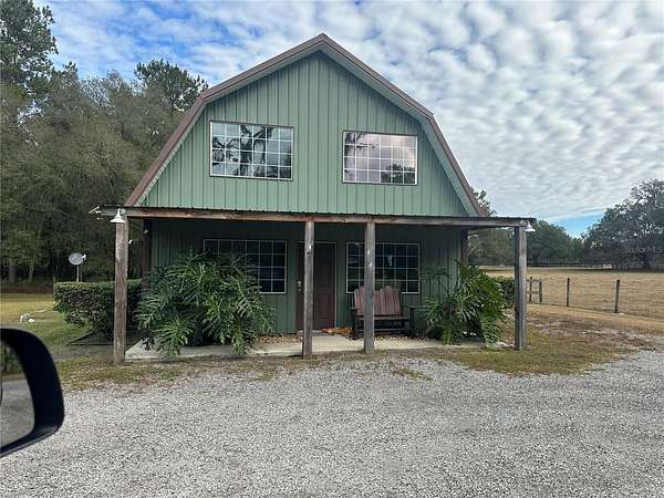 25 Acres of Land with Home for Lease in Reddick, Florida