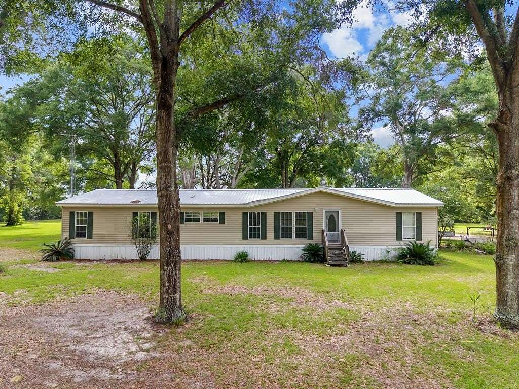 5.76 Acres of Residential Land with Home for Sale in High Springs, Florida