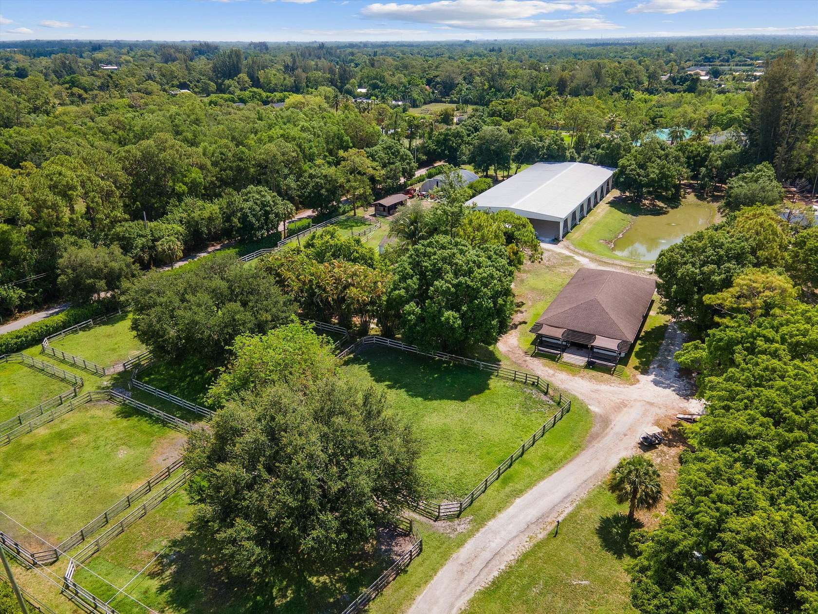 5 Acres of Residential Land with Home for Sale in Loxahatchee Groves, Florida